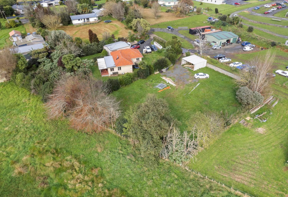 3008m2 section, Nearby Pokeno town centre and Woolworths supermarket, 2 beds 1 bath house with standalone garage, plus a separate sleepout with two rooms, close to motorway access, Zoned Medium Density Residential, with potential for subdivision (subject to council approval), 15A Selby Street, Pokeno