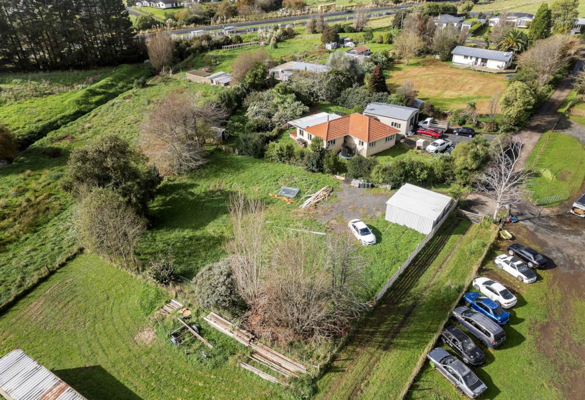 3008m2 section, Nearby Pokeno town centre and Woolworths supermarket, 2 beds 1 bath house with standalone garage, plus a separate sleepout with two rooms, close to motorway access, Zoned Medium Density Residential, with potential for subdivision (subject to council approval), 15A Selby Street, Pokeno