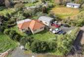 3008m2 section, Nearby Pokeno town centre and Woolworths supermarket, 2 beds 1 bath house with standalone garage, plus a separate sleepout with two rooms, close to motorway access, Zoned Medium Density Residential, with potential for subdivision (subject to council approval), 15A Selby Street, Pokeno