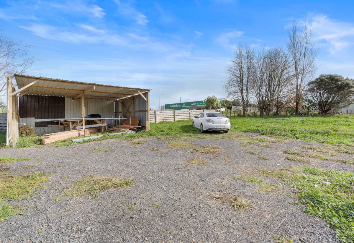 3008m2 section, Nearby Pokeno town centre and Woolworths supermarket, 2 beds 1 bath house with standalone garage, plus a separate sleepout with two rooms, close to motorway access, Zoned Medium Density Residential, with potential for subdivision (subject to council approval), 15A Selby Street, Pokeno