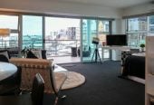 Auckland Girls’ Grammar School zone, Leasehold, 1 bed 1 bath studio apartment, Spacious 50sqm internal layout plus a huge private balcony, positioned in Auckland’s prestigious Princes Wharf. North-facing Corner position with sweeping views of the city, harbour, North Head & Rangitoto, 2.1 km to Auckland Girls’ Grammar School, 39/139 Quay Street, City Centre, Auckland