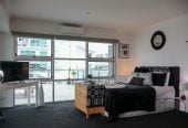 Auckland Girls’ Grammar School zone, Leasehold, 1 bed 1 bath studio apartment, Spacious 50sqm internal layout plus a huge private balcony, positioned in Auckland’s prestigious Princes Wharf. North-facing Corner position with sweeping views of the city, harbour, North Head & Rangitoto, 2.1 km to Auckland Girls’ Grammar School, 39/139 Quay Street, City Centre, Auckland