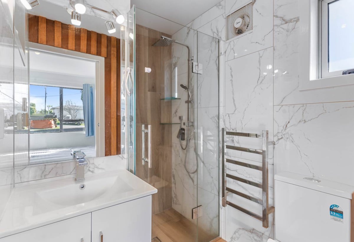 3 beds 2 baths house with carport, downstairs two large multipurpose rooms, close to schools, shops, reserves, 0.3 km to Beach Haven School, 1 km to Birkdale Intermediate School, 1/278 Rangatira Road, Beach Haven, Auckland