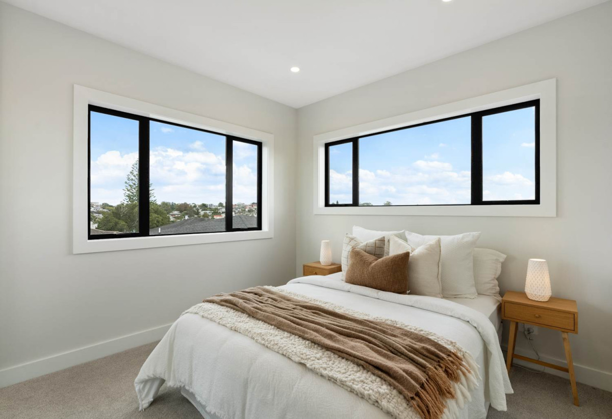Freehold 4 beds (2 ensuites) 3.5 baths home, double garage, 1 ensuite ground floor, 3 + 1 layout, Lift infrastructure installed for future lift installation, Daikin rooftop heating and cooling system, Bluetooth audio system to kitchen and living areas, 2/2 Valonia Street, Mt Roskill, Auckland