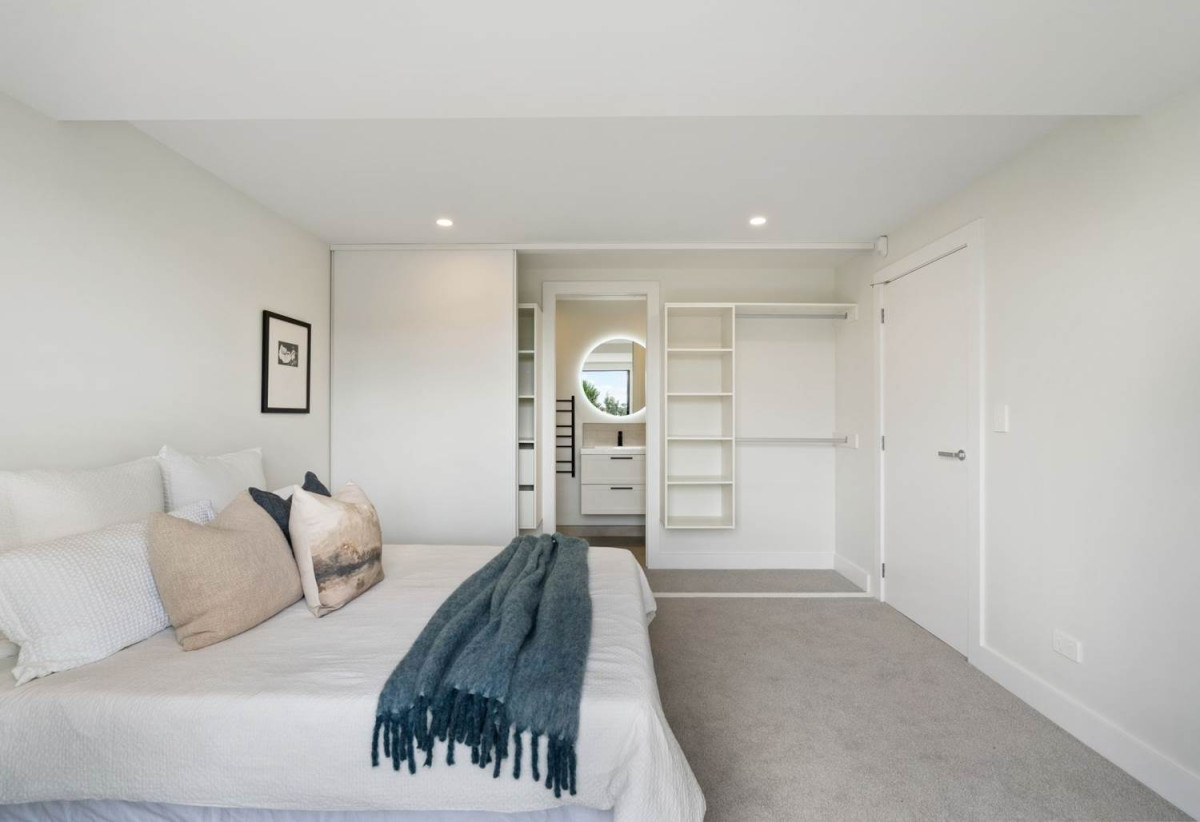 Freehold 4 beds (2 ensuites) 3.5 baths home, double garage, 1 ensuite ground floor, 3 + 1 layout, Lift infrastructure installed for future lift installation, Daikin rooftop heating and cooling system, Bluetooth audio system to kitchen and living areas, 2/2 Valonia Street, Mt Roskill, Auckland