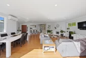 909m2 section, 158m2 4 beds 2 baths main houe PLUS a separate wing/sleepout with a 5th bedroom, bathroom, and covered deck, a massive covered patio with a professional-grade wood-fired pizza oven and a fully equipped outdoor bar area, a large carport, close to reserves, local shops, schools, 23 Tabitha Crescent Henderson, Auckland
