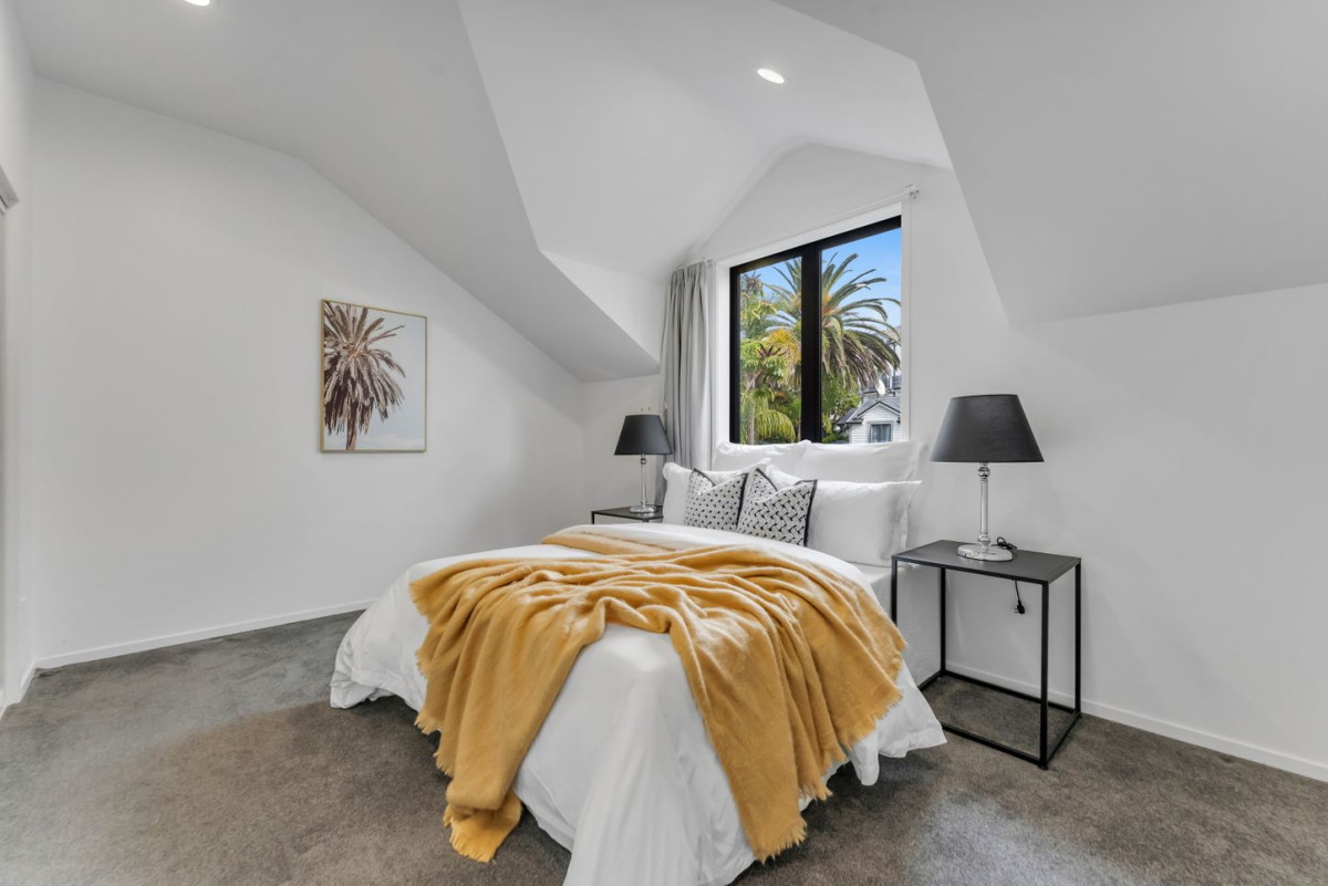 Owners Bound for the Country, 130m2 2 beds 2 baths townhouse with tandem garage, Located within the highly sought-after Summerfield Villas, residents enjoy exclusive access to excellent lifestyle amenities, including a heated swimming pool and fully equipped gym. 78/386 Richmond Road, Grey Lynn, Auckland