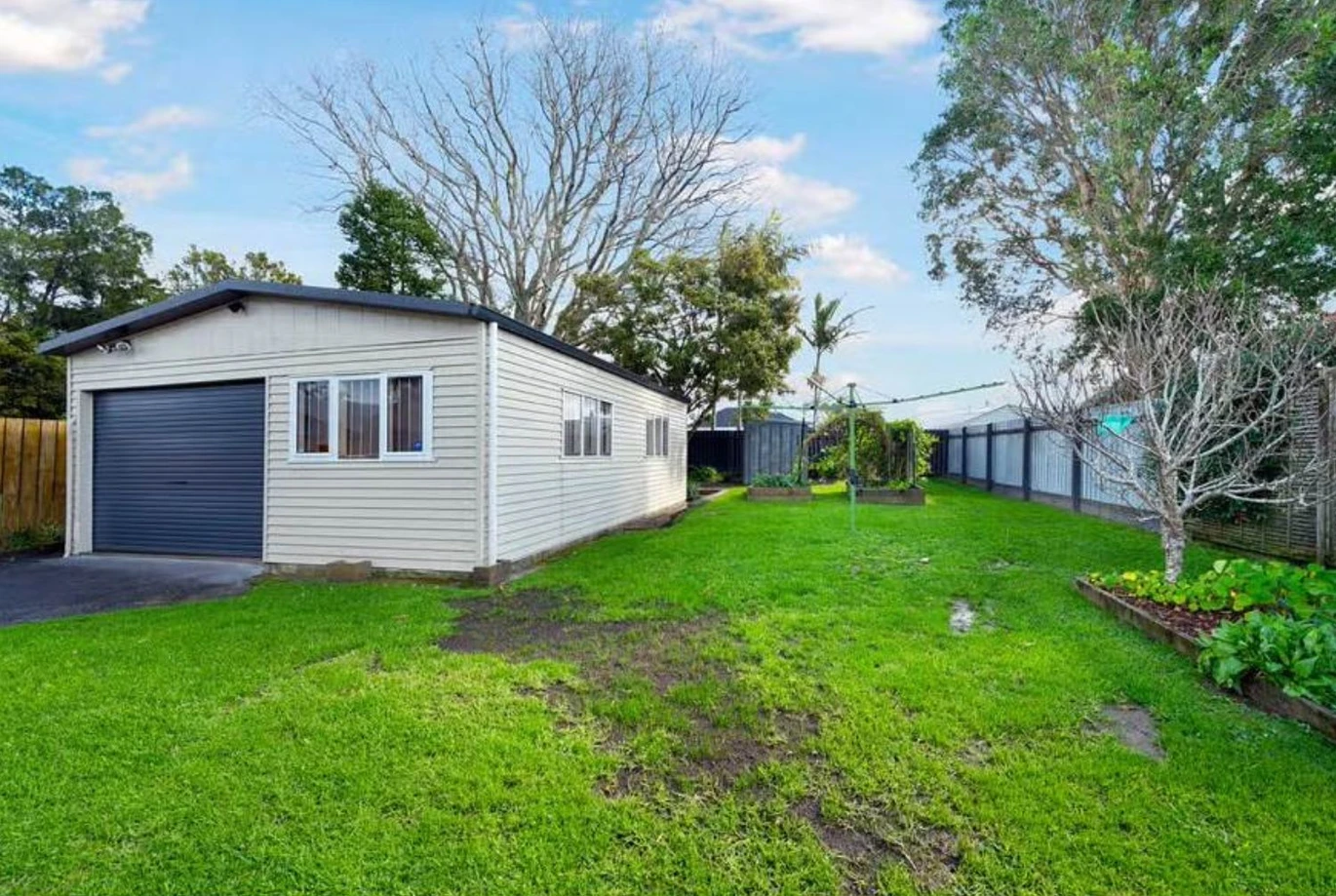 Urgent sale, Must sell, 812m2 section, 3 beds 1 bath house, A secure basement garage paired with ample under-house storage, A massive rear workshop featuring two rooms and three-phase power, 34 Coniston Avenue Te Atatu South, Auckland