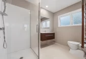 Home and income on 1184m2 section with approved RC for 4 Brick standalone homes, 3 beds + study room 1 bath main house with 2 rumpus rooms downstairs, The Minor Dwelling: A beautifully self-contained 1-bedroom home (complete with a living room, kitchen, and bathroom). currently rented for $449 per week, 148 Astley Avenue New Lynn, Auckland