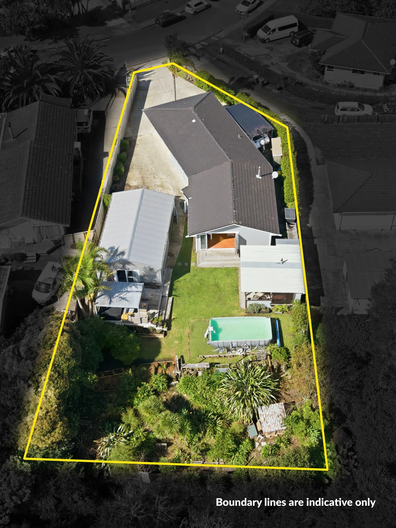 909m2 section, 158m2 4 beds 2 baths main houe PLUS a separate wing/sleepout with a 5th bedroom, bathroom, and covered deck, a massive covered patio with a professional-grade wood-fired pizza oven and a fully equipped outdoor bar area, a large carport, close to reserves, local shops, schools, 23 Tabitha Crescent Henderson, Auckland