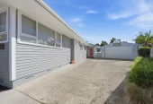 909m2 section, 158m2 4 beds 2 baths main houe PLUS a separate wing/sleepout with a 5th bedroom, bathroom, and covered deck, a massive covered patio with a professional-grade wood-fired pizza oven and a fully equipped outdoor bar area, a large carport, close to reserves, local shops, schools, 23 Tabitha Crescent Henderson, Auckland