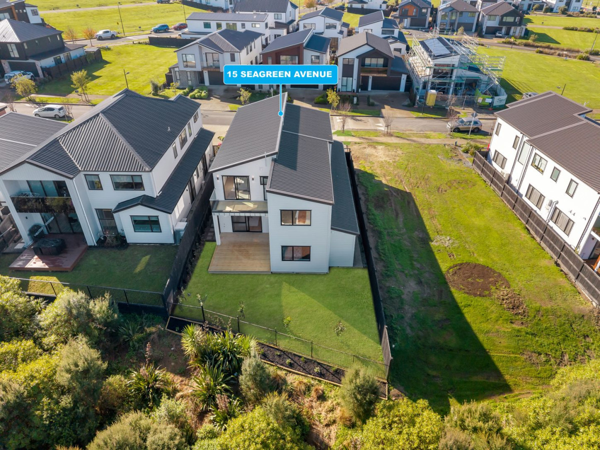 411m2 section backing onto reserve, 2 kitchens, 320m2 Brandnew 6 beds (4 ensuites) + study 5.5 baths house, double garage, 2 beds granny, 15 Seagreen Avenue, Karaka, Auckland