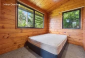 Home and income on 1184m2 section with approved RC for 4 Brick standalone homes, 3 beds + study room 1 bath main house with 2 rumpus rooms downstairs, The Minor Dwelling: A beautifully self-contained 1-bedroom home (complete with a living room, kitchen, and bathroom). currently rented for $449 per week, 148 Astley Avenue New Lynn, Auckland