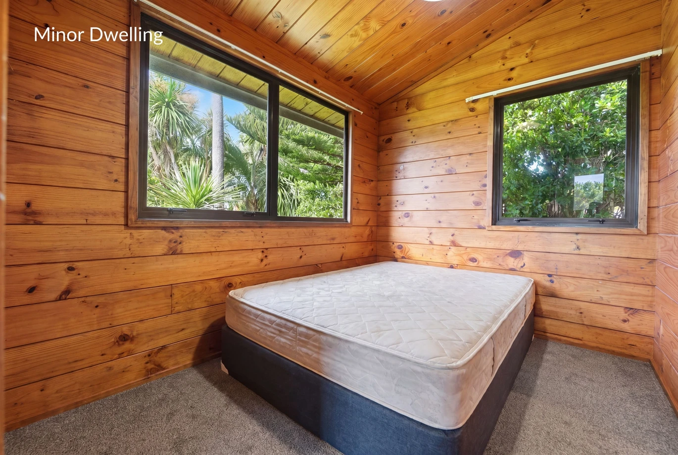 Home and income on 1184m2 section with approved RC for 4 Brick standalone homes, 3 beds + study room 1 bath main house with 2 rumpus rooms downstairs, The Minor Dwelling: A beautifully self-contained 1-bedroom home (complete with a living room, kitchen, and bathroom). currently rented for $449 per week, 148 Astley Avenue New Lynn, Auckland