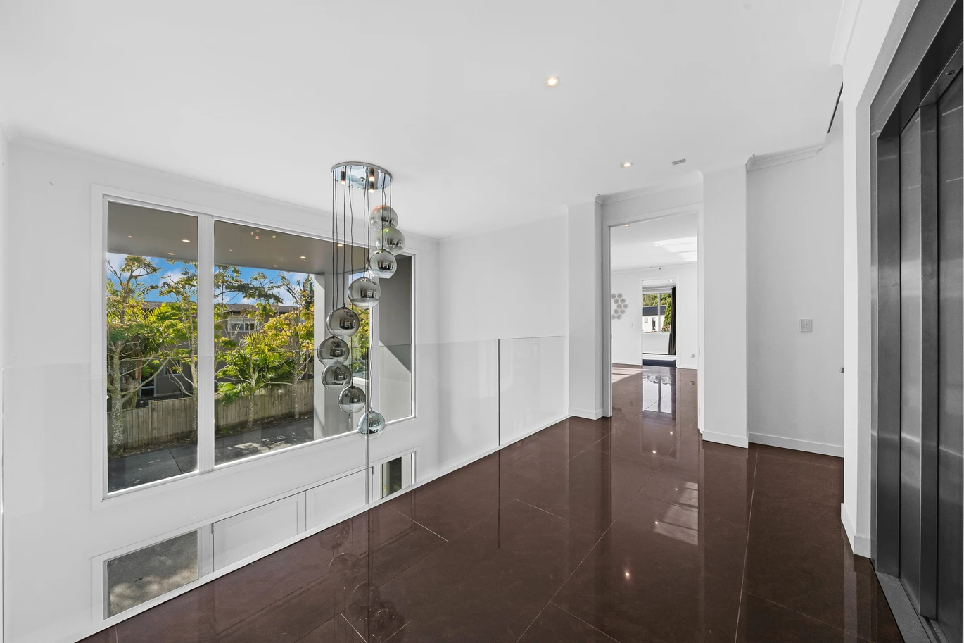 1624m2 section, Botany Downs Secondary College zone, Built-in lift, Over 700m² three-level mansion, 5 beds (5 ensuites) 6.5 baths, Internal-access four-car garage, Resort-style swimming pool, Poolside pavilion featuring: Sauna, Bathroom facilities, Gymnasium. Flexible accommodation ideal as a guest retreat or sleepout, 5.3 km to Botany Downs centre, 11 Kinmont Rise East Tamaki Heights, Auckland