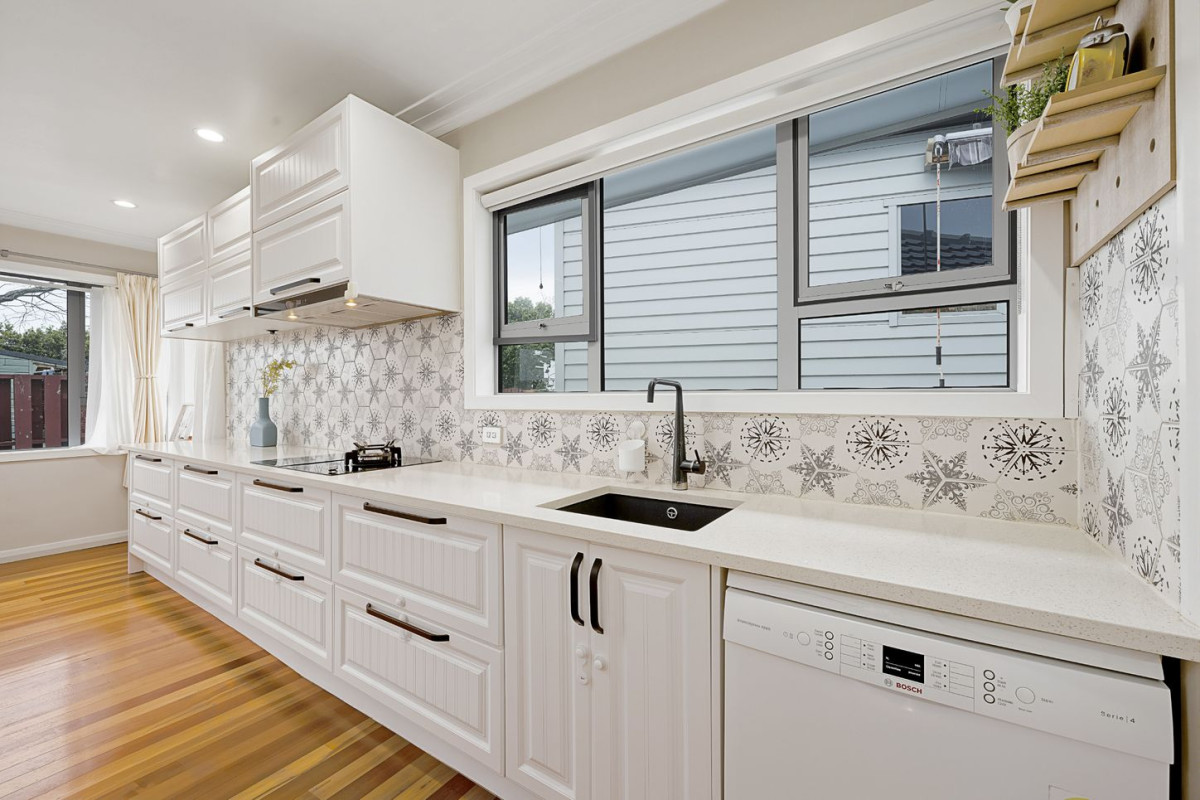 Once in 7 years, 528m2 section, 126m2 3 beds 1 baths house with double garage and Expansive decking, close to local amenities, parks, schools and convenient access to motorway access, 8A Gloria Avenue, Te Atatu Peninsula, Auckland