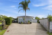 909m2 section, 158m2 4 beds 2 baths main houe PLUS a separate wing/sleepout with a 5th bedroom, bathroom, and covered deck, a massive covered patio with a professional-grade wood-fired pizza oven and a fully equipped outdoor bar area, a large carport, close to reserves, local shops, schools, 23 Tabitha Crescent Henderson, Auckland