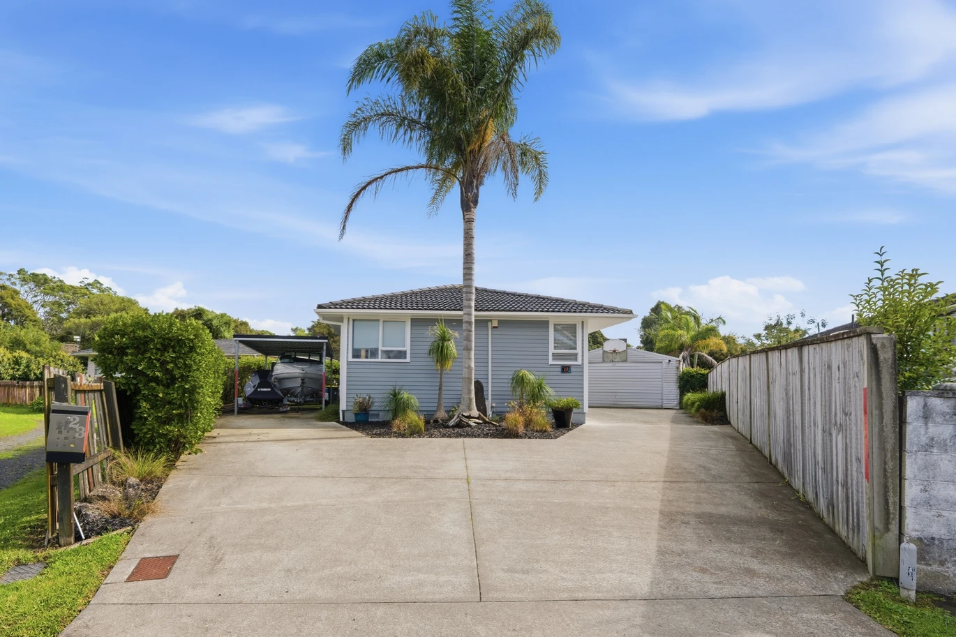 909m2 section, 158m2 4 beds 2 baths main houe PLUS a separate wing/sleepout with a 5th bedroom, bathroom, and covered deck, a massive covered patio with a professional-grade wood-fired pizza oven and a fully equipped outdoor bar area, a large carport, close to reserves, local shops, schools, 23 Tabitha Crescent Henderson, Auckland
