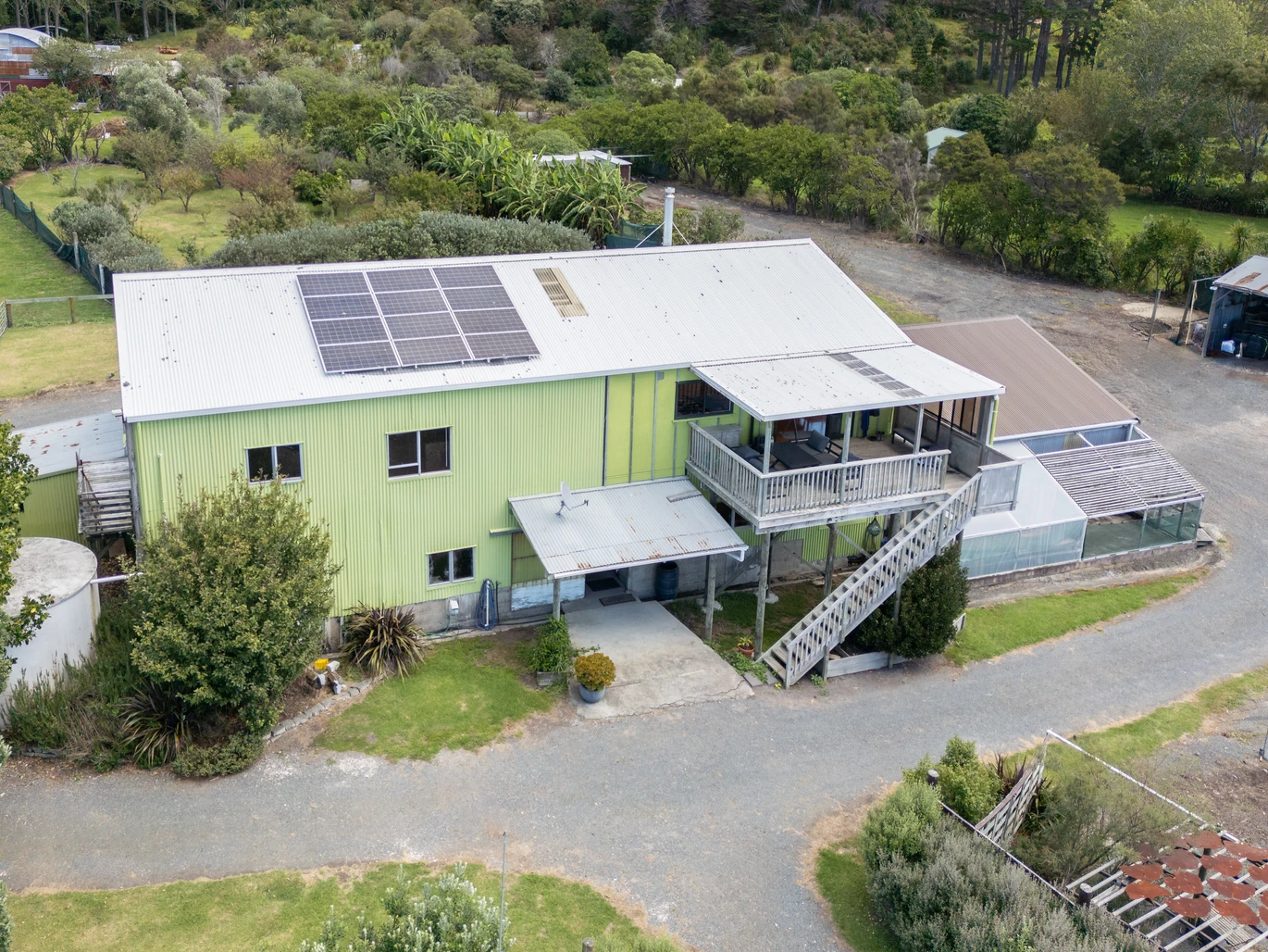 43000m2 section by the sea, LIFESTYLE, INCOME & OPPORTUNITY, Highlights include an impressive four-bay greenhouse spanning approximately 1,800sqm, a 1.2 million litre lined water reservoir, substantial workshop and packing facilities, a walk-in chiller, generous office space, and established propagation areas. a 3 beds bungalow surrounded by established cottage, A separate garage with loft accommodation, 100 Robinson Road Whangarei Heads, Whangarei District