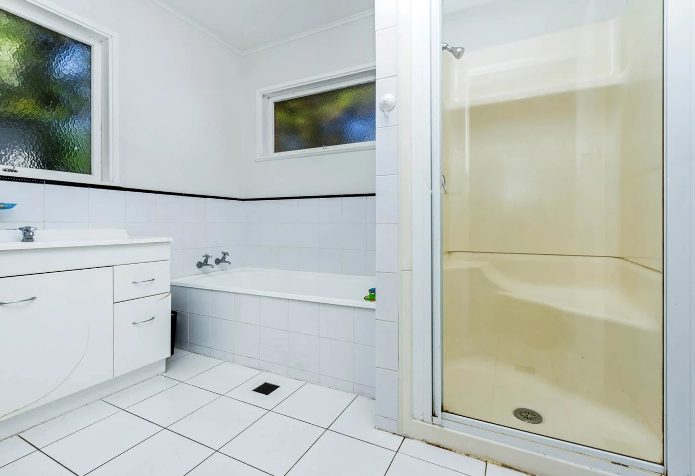 575m2 section on Local Centre zoning, 118m2 Brick 3 beds 2 baths house with carport and standalone double garage, Downstairs a massive rumpus room and Complete with an additional bathroom and laundry, 450 Don Buck Road Massey, Auckland