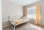 Robust construction – Concrete block and brick, 3 beds + Flexi room 2 baths home, Upstairs: 2 beds 1 bath, Separate living room with access to a sunny porch, Open-plan kitchen and dining area, Downstairs: Additional bedroom plus living area, Bathroom and utility room, 2/2B Yeoman Place, Howick, Auckland