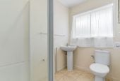 Robust construction – Concrete block and brick, 3 beds + Flexi room 2 baths home, Upstairs: 2 beds 1 bath, Separate living room with access to a sunny porch, Open-plan kitchen and dining area, Downstairs: Additional bedroom plus living area, Bathroom and utility room, 2/2B Yeoman Place, Howick, Auckland