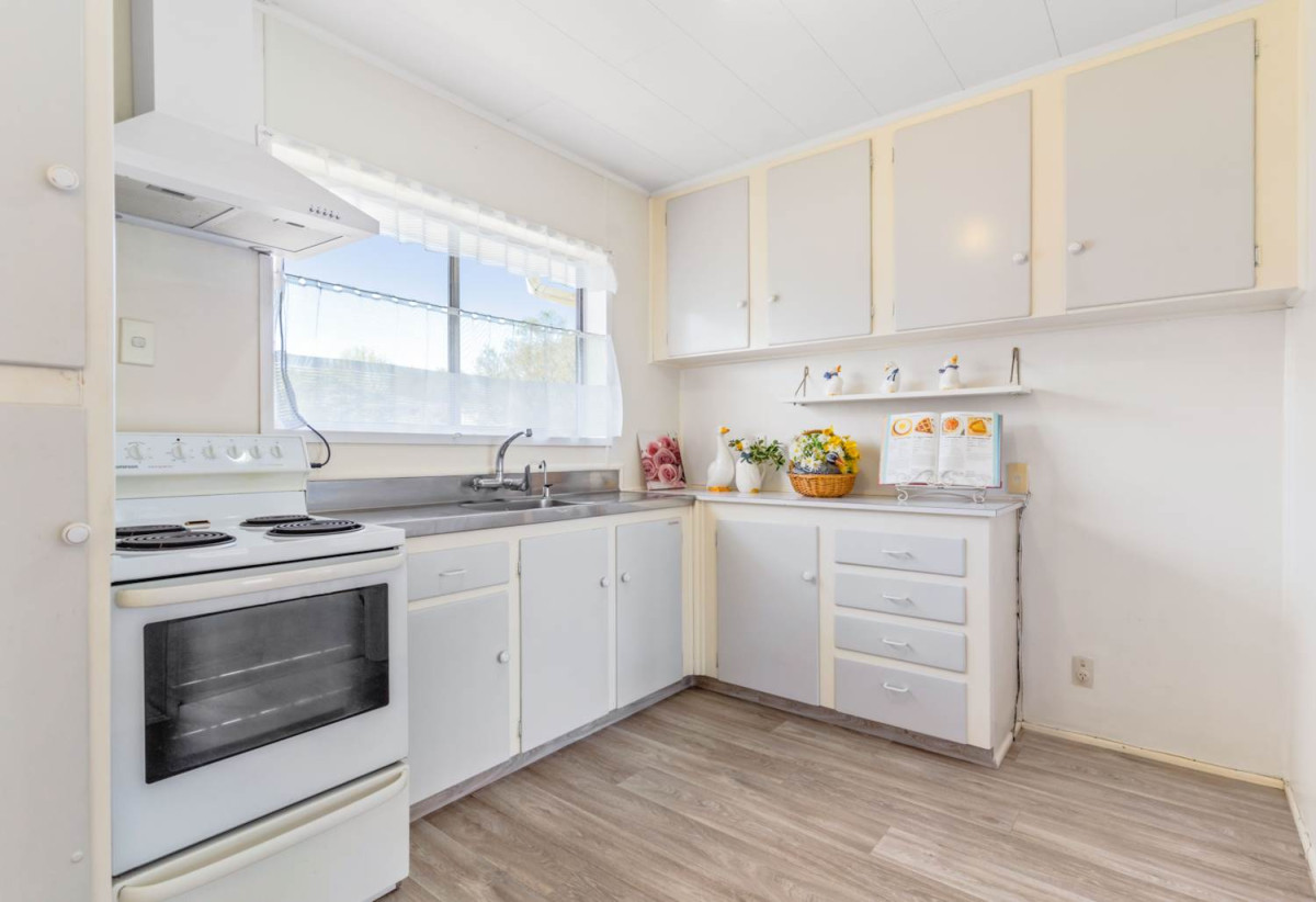 Robust construction – Concrete block and brick, 3 beds + Flexi room 2 baths home, Upstairs: 2 beds 1 bath, Separate living room with access to a sunny porch, Open-plan kitchen and dining area, Downstairs: Additional bedroom plus living area, Bathroom and utility room, 2/2B Yeoman Place, Howick, Auckland