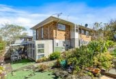 Robust construction – Concrete block and brick, 3 beds + Flexi room 2 baths home, Upstairs: 2 beds 1 bath, Separate living room with access to a sunny porch, Open-plan kitchen and dining area, Downstairs: Additional bedroom plus living area, Bathroom and utility room, 2/2B Yeoman Place, Howick, Auckland