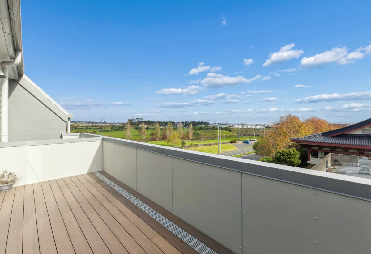 With three balconies in total, 2 beds 1 bath modern two-level apartment with 1 car park, next to Barry Curtis Park and the Fo Guang Shan Temple, 16/63 Kestev Drive, Flat Bush, Auckland