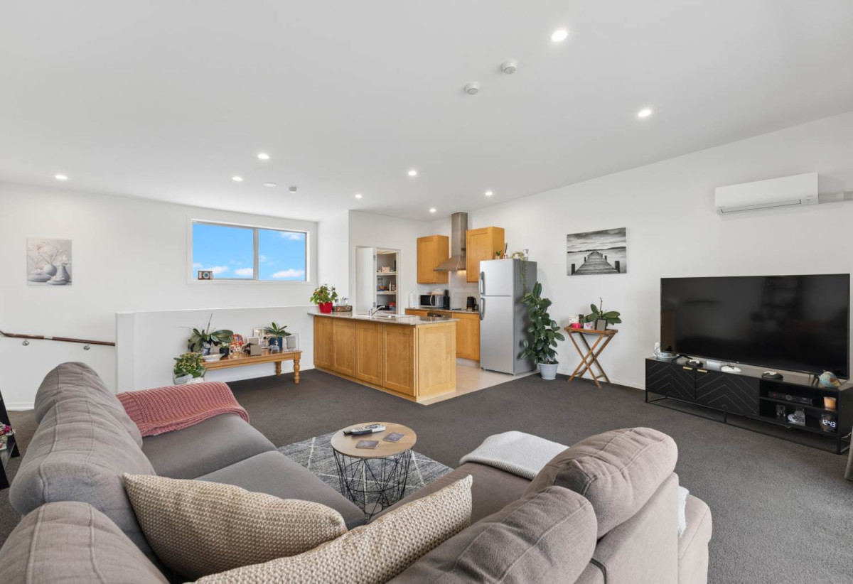 With three balconies in total, 2 beds 1 bath modern two-level apartment with 1 car park, next to Barry Curtis Park and the Fo Guang Shan Temple, 16/63 Kestev Drive, Flat Bush, Auckland