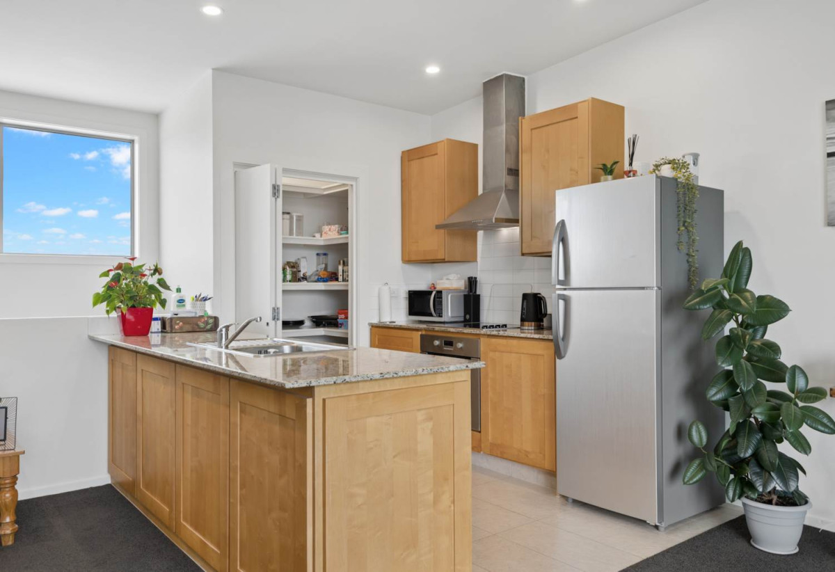 With three balconies in total, 2 beds 1 bath modern two-level apartment with 1 car park, next to Barry Curtis Park and the Fo Guang Shan Temple, 16/63 Kestev Drive, Flat Bush, Auckland