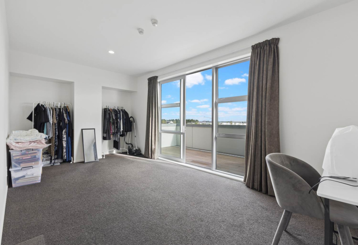 With three balconies in total, 2 beds 1 bath modern two-level apartment with 1 car park, next to Barry Curtis Park and the Fo Guang Shan Temple, 16/63 Kestev Drive, Flat Bush, Auckland