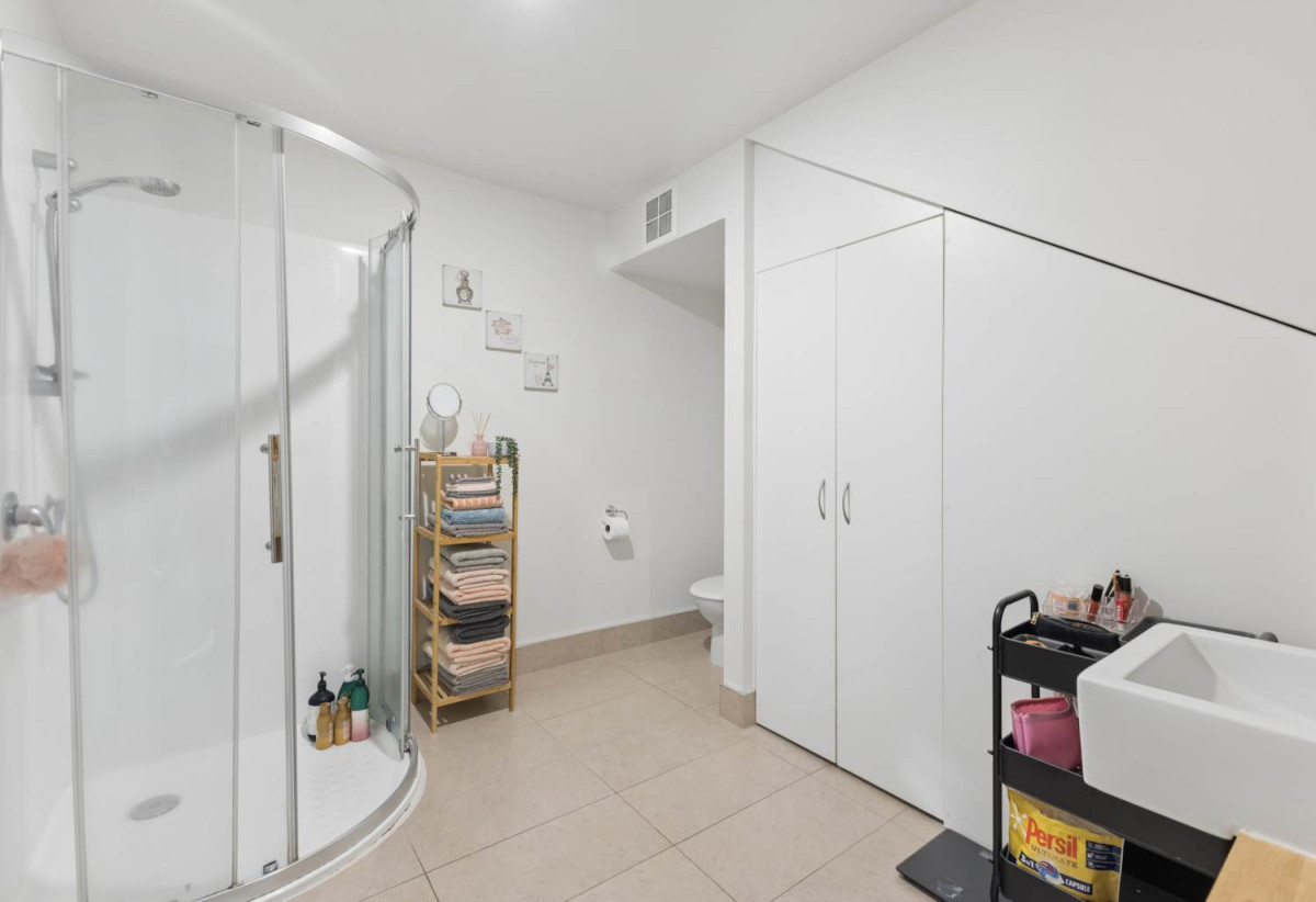 With three balconies in total, 2 beds 1 bath modern two-level apartment with 1 car park, next to Barry Curtis Park and the Fo Guang Shan Temple, 16/63 Kestev Drive, Flat Bush, Auckland