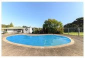 33753m2 of residentially zoned land, 3 beds 1 bath house, 1.7 km to Target Road School, 2.6 km to Albany Junior High School, 42 Albany Highway, Greenhithe, Auckland