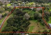 MORTGAGEE SALE, 16835m2 section, Two dwellings, total 5 beds 3 baths, Further improvements include a large high-stud shed of approximately 350m², complete with a mezzanine level. 369 Upper Harbour Drive, Greenhithe, Auckland