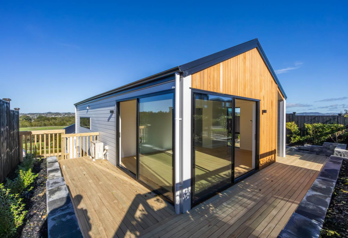 Striking three-level 4 beds (1 ensuite) 2.5 baths house with double garage, a spectacular top-floor retreat that’s made for entertaining. Throw open the doors to the elevated balcony overlooking the Warkworth Club, 35 Mamaku Lane, Warkworth, Auckland