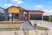 With views across a peaceful bush reserve, 5 beds (2 ensuites) 3 baths house with double garage, Crafted from premium James Hardie and brick, 51 Emerald Avenue, Karaka, Auckland