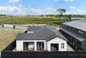 With views across a peaceful bush reserve, 5 beds (2 ensuites) 3 baths house with double garage, Crafted from premium James Hardie and brick, 51 Emerald Avenue, Karaka, Auckland