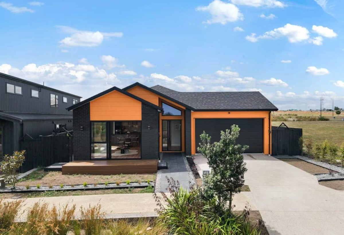With views across a peaceful bush reserve, 5 beds (2 ensuites) 3 baths house with double garage, Crafted from premium James Hardie and brick, 51 Emerald Avenue, Karaka, Auckland