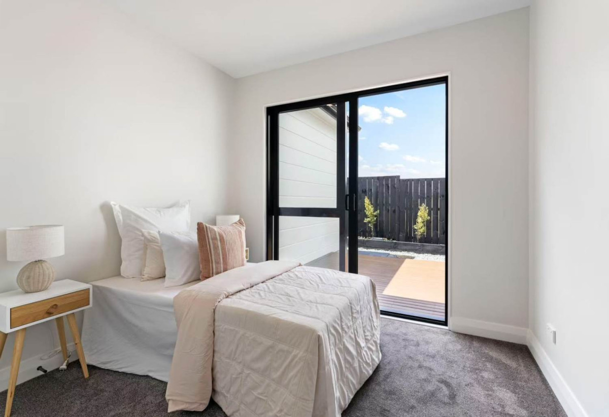 With views across a peaceful bush reserve, 5 beds (2 ensuites) 3 baths house with double garage, Crafted from premium James Hardie and brick, 51 Emerald Avenue, Karaka, Auckland