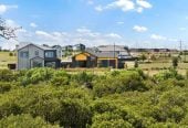 With views across a peaceful bush reserve, 5 beds (2 ensuites) 3 baths house with double garage, Crafted from premium James Hardie and brick, 51 Emerald Avenue, Karaka, Auckland