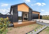 With views across a peaceful bush reserve, 5 beds (2 ensuites) 3 baths house with double garage, Crafted from premium James Hardie and brick, 51 Emerald Avenue, Karaka, Auckland