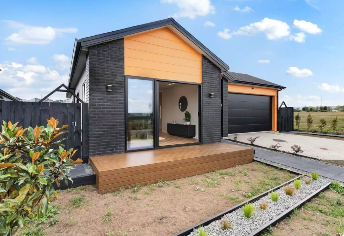 With views across a peaceful bush reserve, 5 beds (2 ensuites) 3 baths house with double garage, Crafted from premium James Hardie and brick, 51 Emerald Avenue, Karaka, Auckland