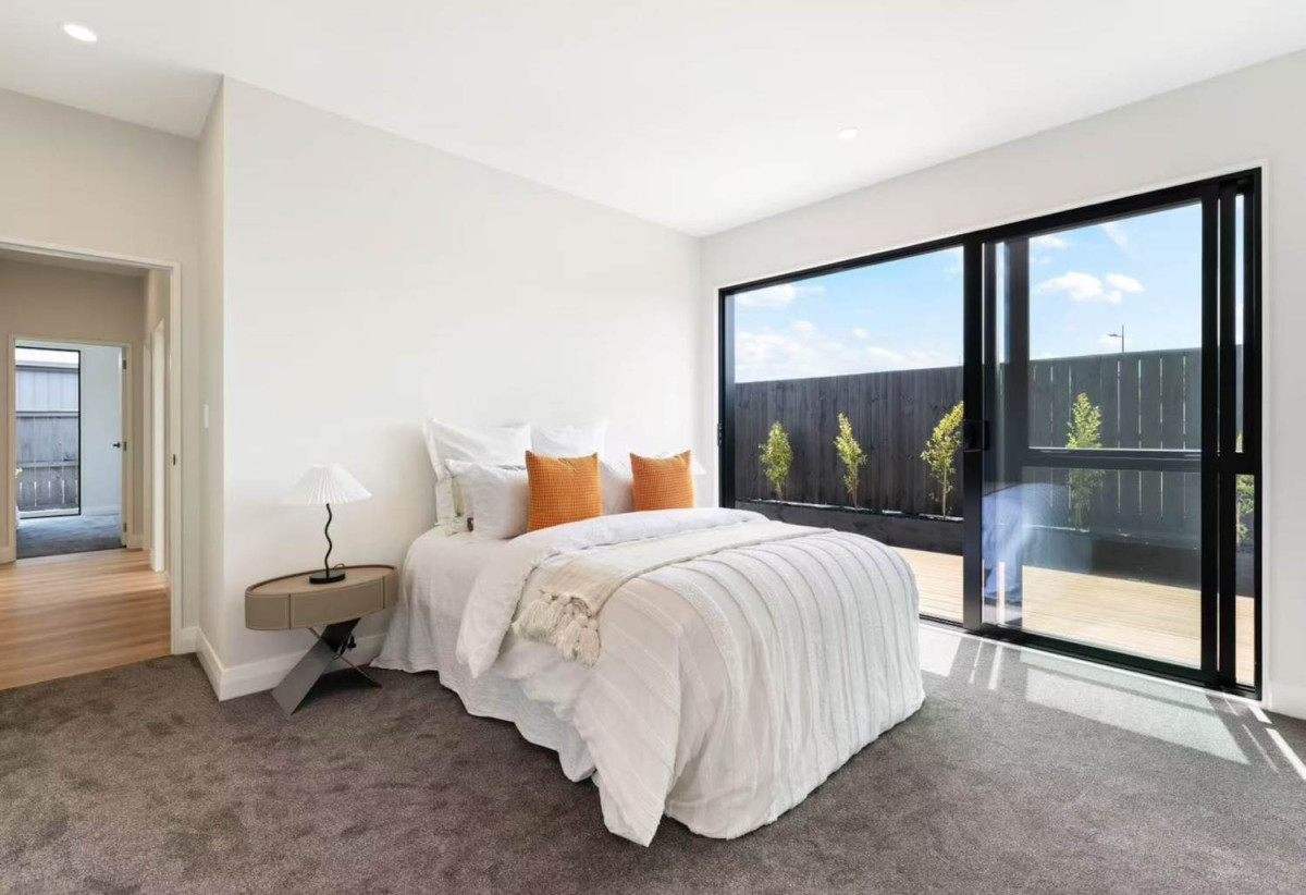 With views across a peaceful bush reserve, 5 beds (2 ensuites) 3 baths house with double garage, Crafted from premium James Hardie and brick, 51 Emerald Avenue, Karaka, Auckland