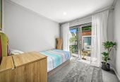 209m2 Renovated 4 beds 2 baths house with carport, upstairs 3 beds 1 bath kitchen living with central heating, Downstairs 1 bed 1 bath kitchenette a heat pump and its own slider entrance, 128A Kohimarama Road, Kohimarama, Auckland