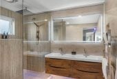 209m2 Renovated 4 beds 2 baths house with carport, upstairs 3 beds 1 bath kitchen living with central heating, Downstairs 1 bed 1 bath kitchenette a heat pump and its own slider entrance, 128A Kohimarama Road, Kohimarama, Auckland
