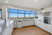 Unbeatable Views & Newly Renovated, 817m2 section, 3 beds + study 2 baths house with double garage, 825 East Coast Road, Browns Bay, Auckland