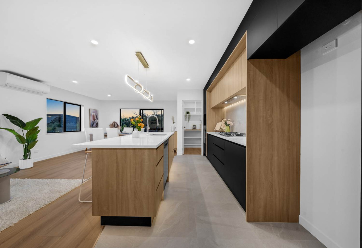 2 kitchens, 5 beds 3.5 baths house with double garage, A versatile self-contained accommodation wing with its own living area, 1 bed, 1 bath and private external entrance, 61 Rongoa Maori Way, Pukekohe, Auckland