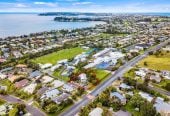 MORTGAGEE SALE, 949m2 section, Positioned next door to Stanmore Bay School, Previously consented and operated as an educational training facility for a number of years, the layout comprises multiple office spaces, a large open-plan area, kitchen facilities and two separate toilets, 32 Waiora Road, Stanmore Bay, Auckland