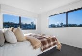 1030m2 section, Elegant Living, Sea Views & Rangitoto Zones, 6 beds (1 ensuite) + study 3.5 baths house with garage and swimming pool, A supersized entertaining lounge on the lower level, along with its own bathroom and two generous bedrooms, provides exceptional flexibility. 32 Bellbird Rise, Murrays Bay, Auckland